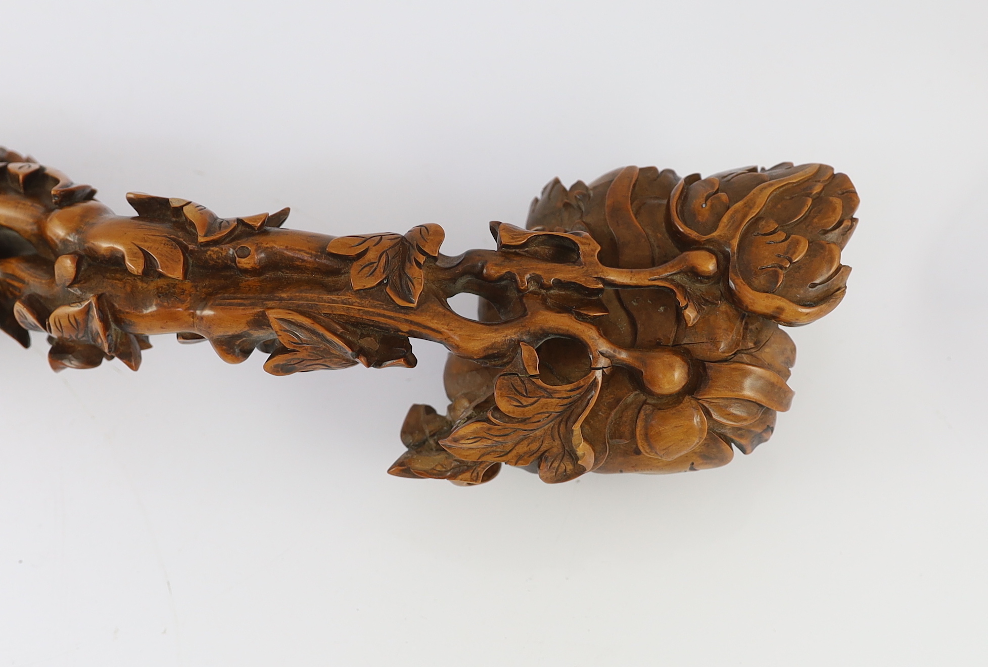 A Chinese boxwood ‘peony’ ruyi sceptre, 19th/20th century